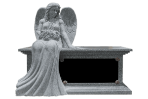 Stone angel statue seated on bench