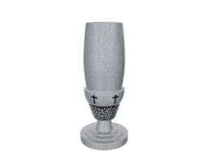 Silver vase with cross design accents.