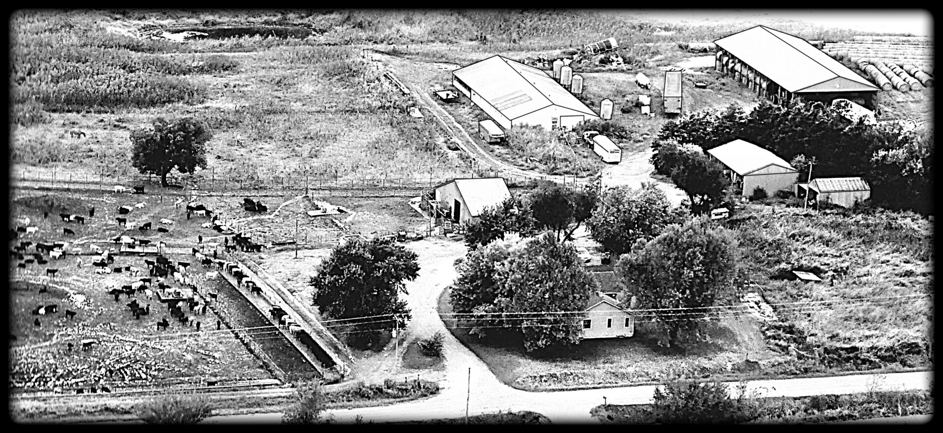 Aerial view of a rural farm landscape.