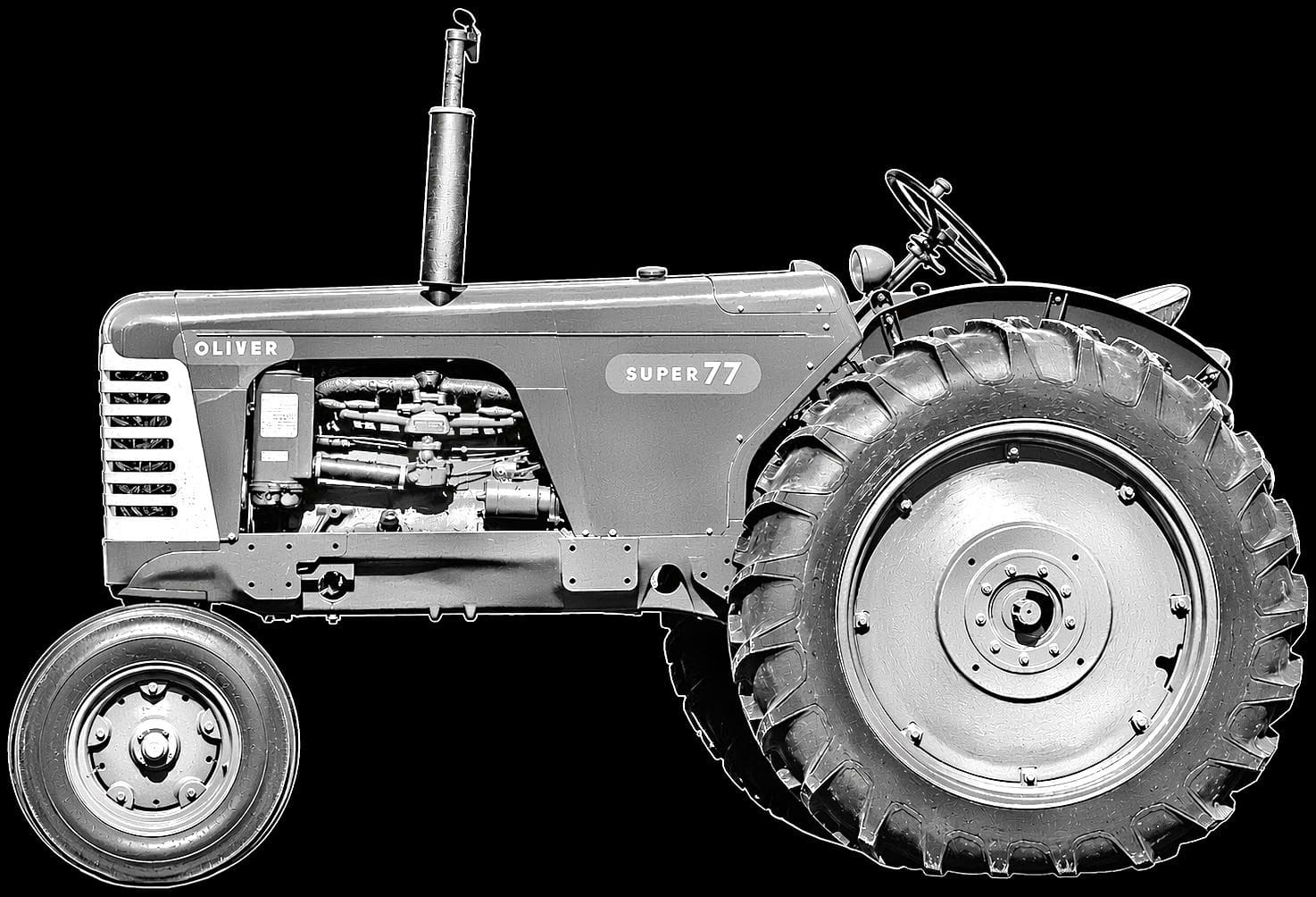 Vintage Oliver Super 77 tractor in profile.