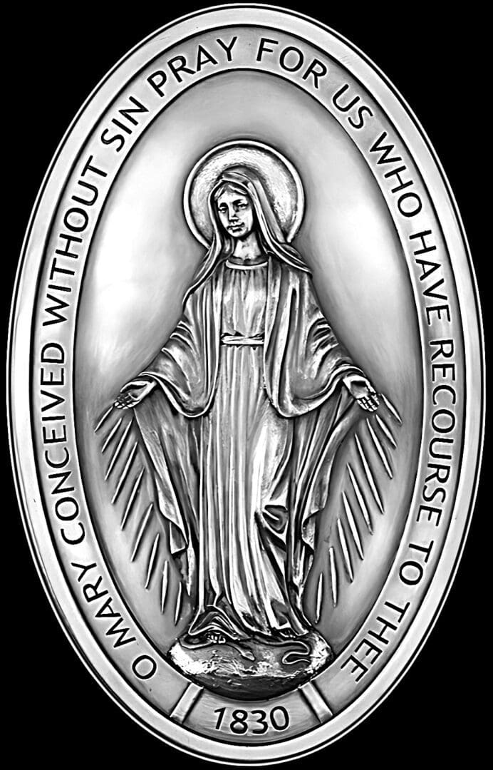 Religious medallion featuring the Virgin Mary.